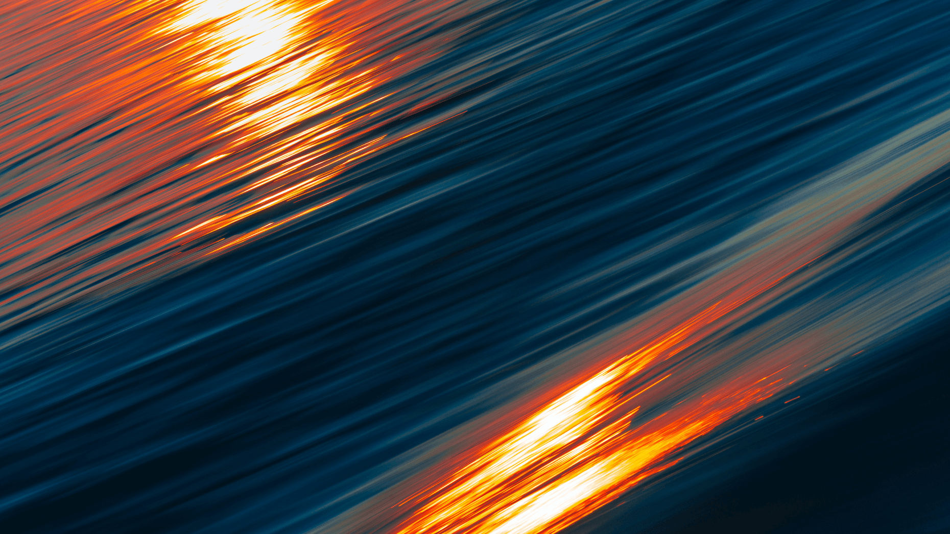 Abstraktes blau-oranges Foto mit Lichtreflexen