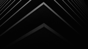 Abstrakte graue perspektivische Streifen vor schwarzem Hintergrund